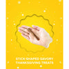 Plato Thanksgiving Dinner Sticks Dog Treats in Hand